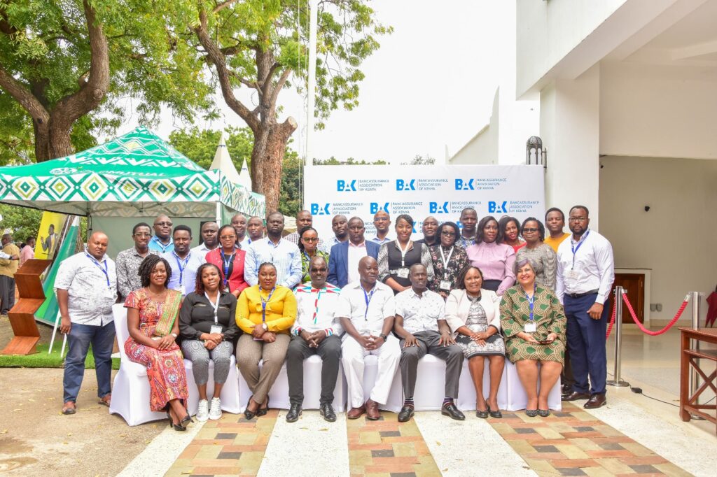 The Chief Guest IRA CEO Mr Godfrey Kiptum takes a Photo with principal officers of all bancassurance intermediaries in attendance | BAK